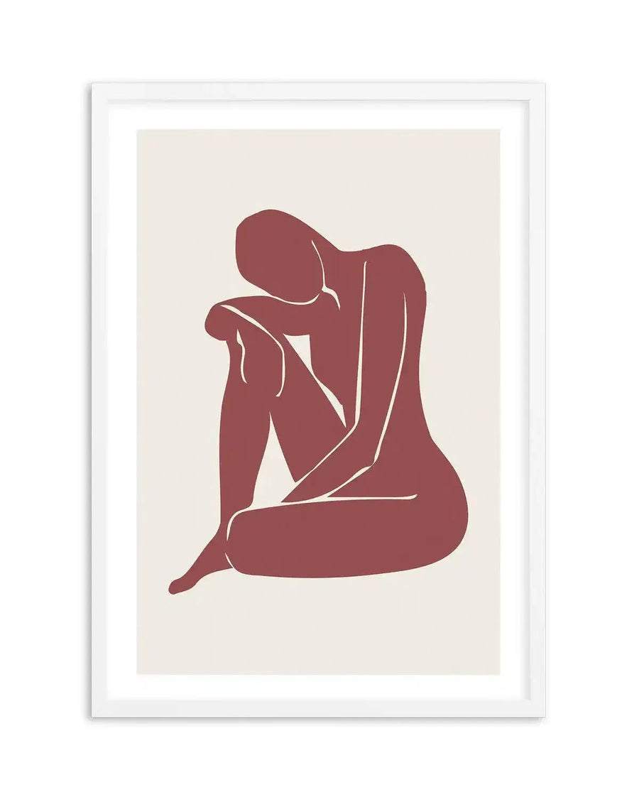 Art print featuring a minimalist illustration of a seated female figure in a contemplative pose, rendered in a solid deep terracotta red against a soft cream background, with subtle white lines defining the limbs, displayed in a white frame with white border.