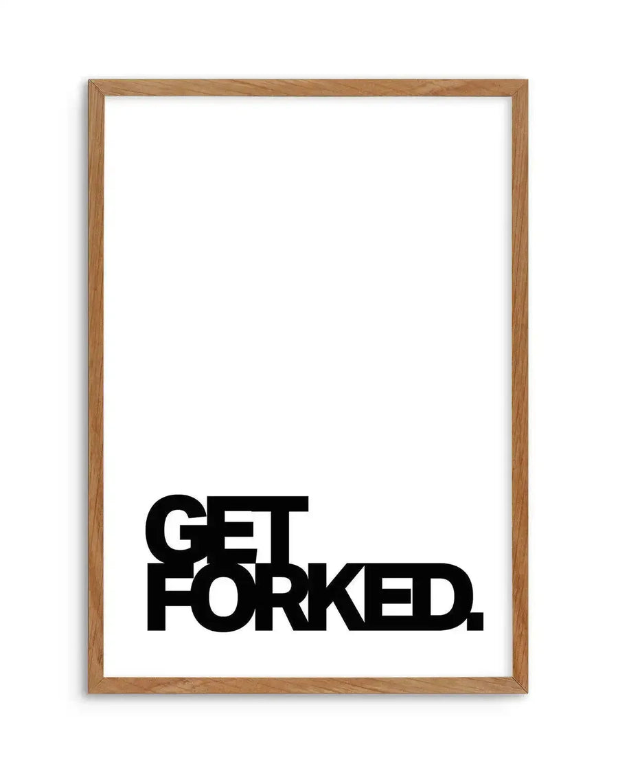 Art print with bold black typography reading "GET FORKED." in a heavy sans-serif font, centered in the lower portion of a white background. The print is displayed in a natural wood frame with a light honey tone and subtle wood grain texture. The overall composition is minimalist and graphic, with ample white space above the text.