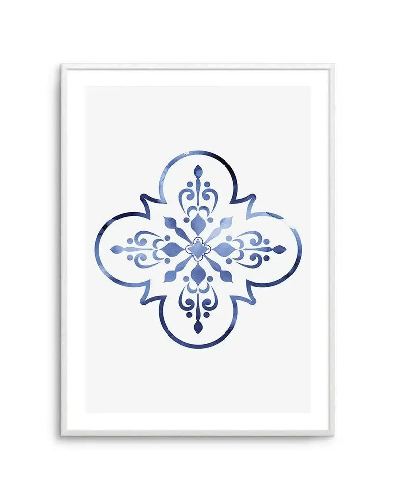 Art print featuring a symmetrical, ornate quatrefoil design in varying shades of blue, from deep navy to lighter sky blue, with a watercolour texture and visible brushstrokes, displayed in a white frame with a white border.