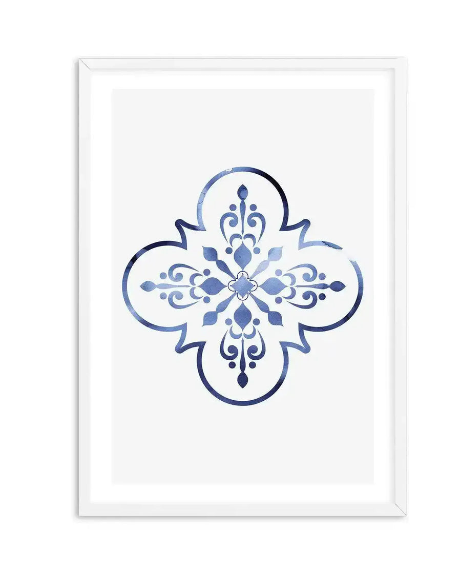 Watercolour art print featuring a symmetrical quatrefoil design in varying shades of blue, from deep indigo to pale sky blue, with a textured, mottled appearance, displayed in a white frame with white border.