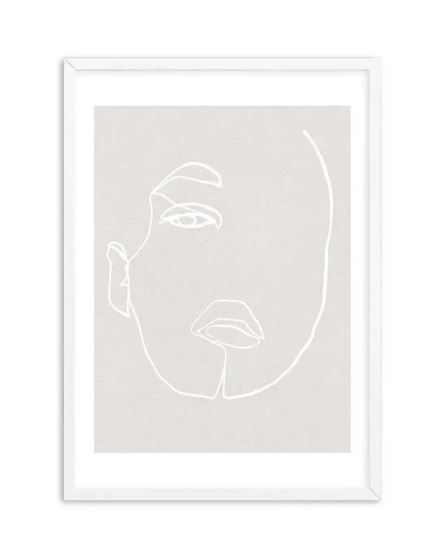Line art print featuring a minimalist illustration of a woman's face in white against a textured light grey background, with a white frame and white border. The composition shows the left side of the face, with an eye, nose, and lips defined by continuous, flowing lines.