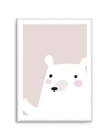 Framed art print featuring a minimalist illustration of a white bear's face against a soft dusty rose background. The bear has black dot eyes, a black nose, gray cheek patch, and pink circular cheeks, rendered in a simple, child-friendly style. White wooden frame with white border around the illustration.