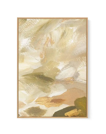 Framed canvas art print featuring an abstract composition in warm, neutral tones. The design showcases layered brushstrokes in cream, ivory, khaki, sage green, and gold leaf accents, creating a textured, painterly effect. Soft sweeping marks and organic shapes blend across the canvas in a contemporary style. The artwork is displayed in a natural wood frame with a white border, presented against a plain background.
