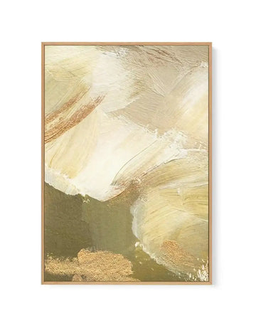 Abstract canvas print featuring broad, expressive brushstrokes in warm cream, pale yellow, and muted olive green, with accents of metallic gold. The composition suggests a dynamic, flowing landscape or atmospheric scene, with visible paint texture and a natural wood frame.