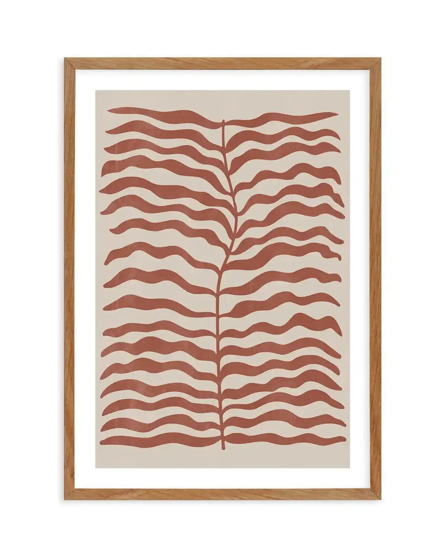 Art print featuring a central stem with numerous wavy, horizontal leaves in a warm, muted red-earth tone against a light beige background, displayed in a natural oak frame with white border.