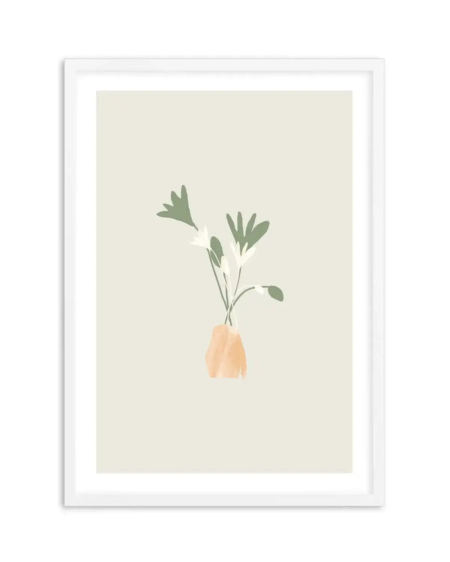 Watercolour art print featuring a minimalist illustration of three white flowers with sage green leaves in an abstract peach-toned vase, printed on fine art paper and displayed in a white frame with white border.
