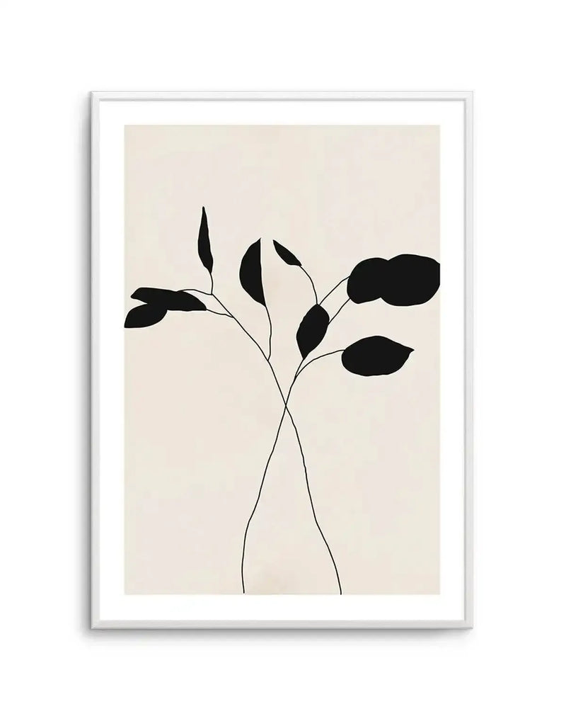 Art print featuring two stylized plant stems with abstract black leaves on a warm cream background, printed on fine art paper and displayed in a white frame with white border.