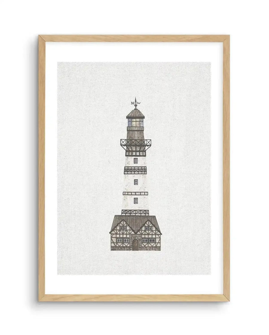 Watercolour art print featuring a tall lighthouse with a weather vane on top, rendered in a muted palette of browns, greys, and whites, with a small house at its base, displayed in a natural oak frame with white border.
