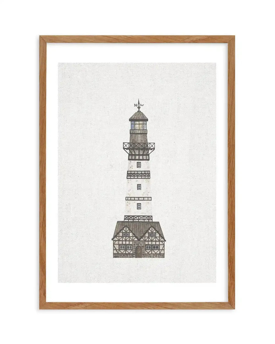 Watercolour art print featuring a detailed illustration of a lighthouse with a half-timbered base, rendered in shades of grey, brown, and white on a textured cream background, displayed in a natural oak frame with white border.