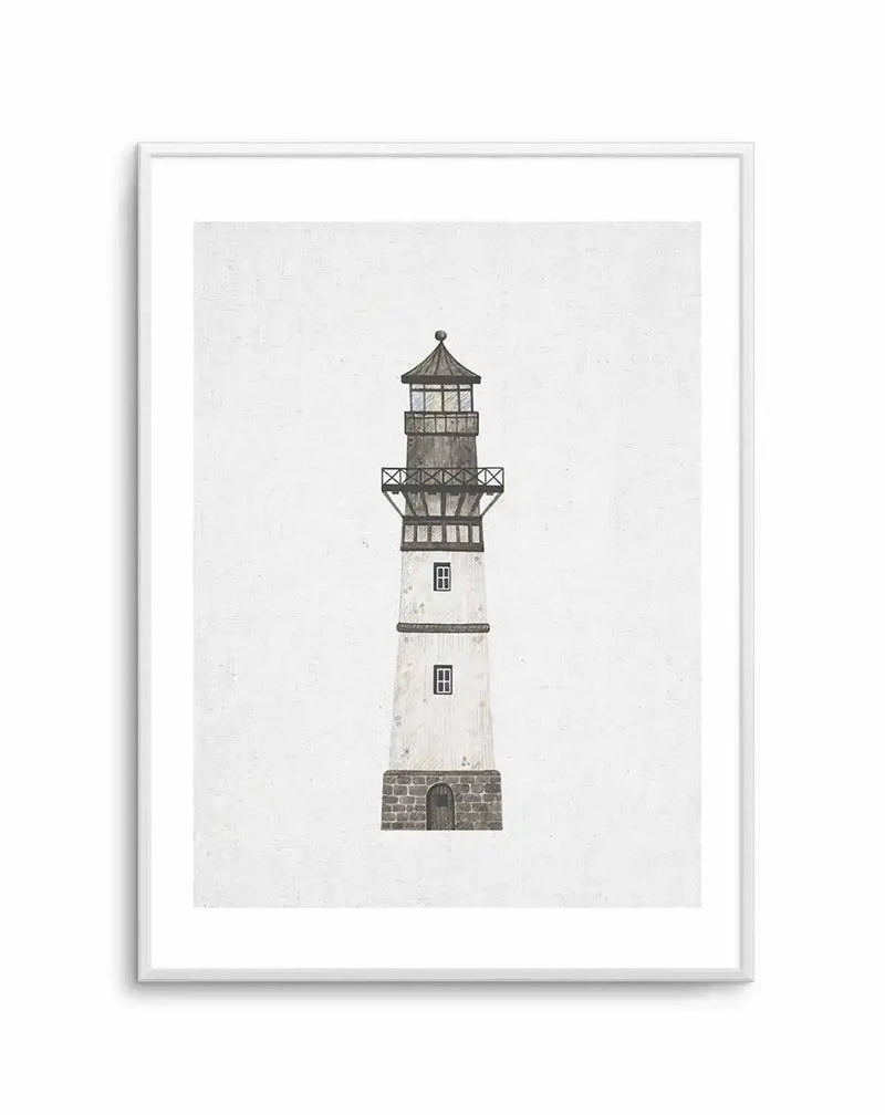 Watercolour art print featuring a tall, slender lighthouse with a white base and dark grey stone foundation, topped with a dark grey lantern room and roof, set against a textured white background. The lighthouse has two small square windows and a dark arched doorway at its base, and a dark grey railing around the lantern room. The print is displayed in a white frame with a white border.