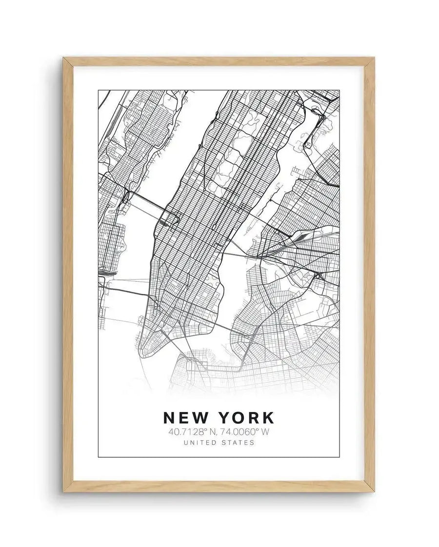 Line art map print of New York City, featuring a detailed street grid of Manhattan and surrounding boroughs, with rivers and bridges clearly delineated in black lines on a white background. The print is displayed in a natural oak frame with a white border, and includes the text "NEW YORK" in large black letters, followed by "40.7128° N, 74.0060° W" and "UNITED STATES" in smaller text below.