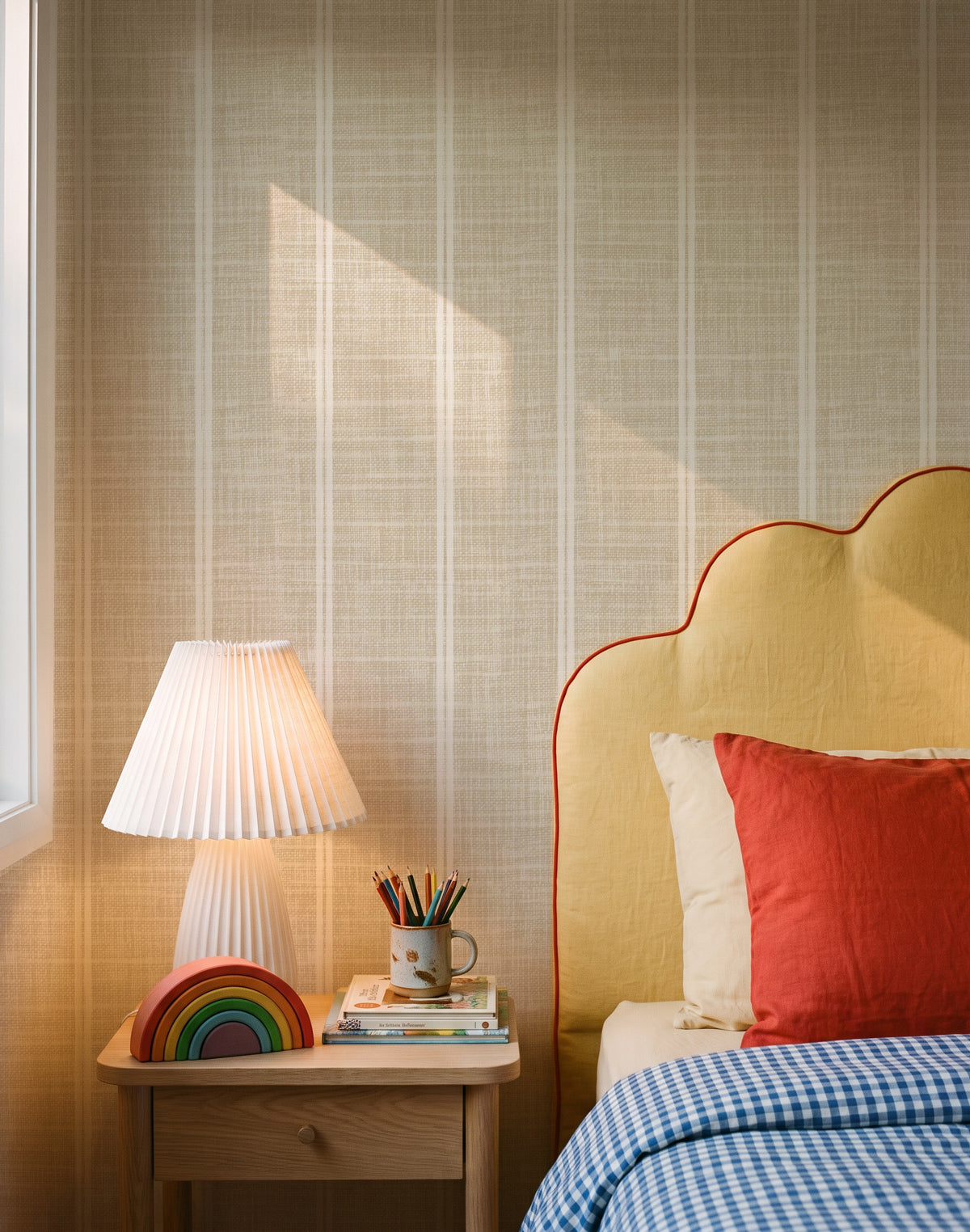 Oatmeal Linen Double Stripe linen wallpaper styled in a warm children's bedroom