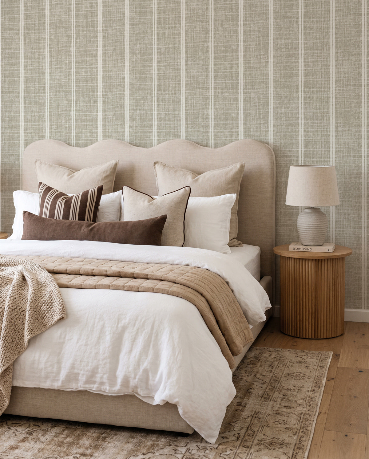 Warm Grey Linen Double Stripe linen wallpaper in a softly layered neutral bedroom