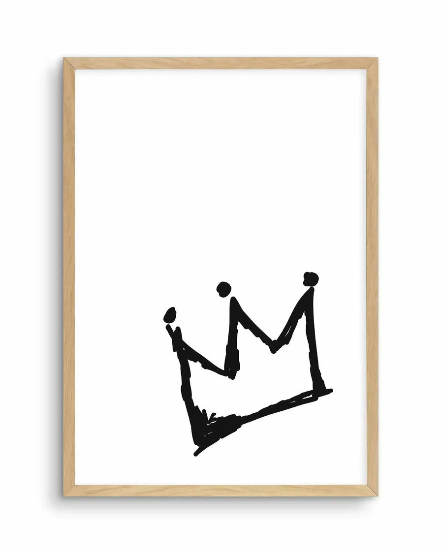 Minimalist line drawing art print in a natural wood frame showing three stylized black silhouette figures holding hands to form the shape of a crown. The figures are rendered in simple, continuous black lines against a white background. The composition is centered in the lower portion of the frame, leaving substantial white space above. The natural wood frame has a light, unfinished appearance with visible grain texture.
