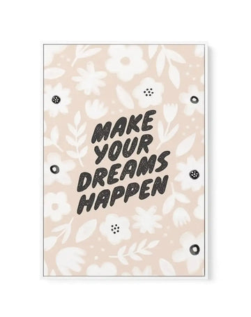 Framed canvas art print featuring the motivational text "Make Your Dreams Happen" in black hand-drawn lettering centered on a beige background. The design is surrounded by a repeating pattern of white and cream-colored flowers, leaves, and botanical elements in various sizes. The canvas has a gray frame with white border and five black circular hanging holes visible around the edges. The overall aesthetic is minimalist and botanical with a warm, neutral color palette.