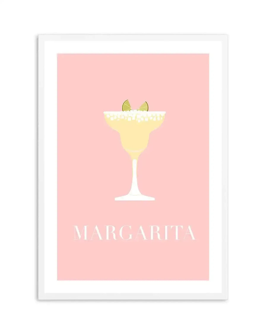 Art print featuring a minimalist illustration of a margarita cocktail on a soft pink background. The drink is depicted in a classic margarita glass with a salted rim and two lime wedges, rendered in pale yellow and white with clean lines. The word "MARGARITA" is written in white capital letters at the bottom of the print.