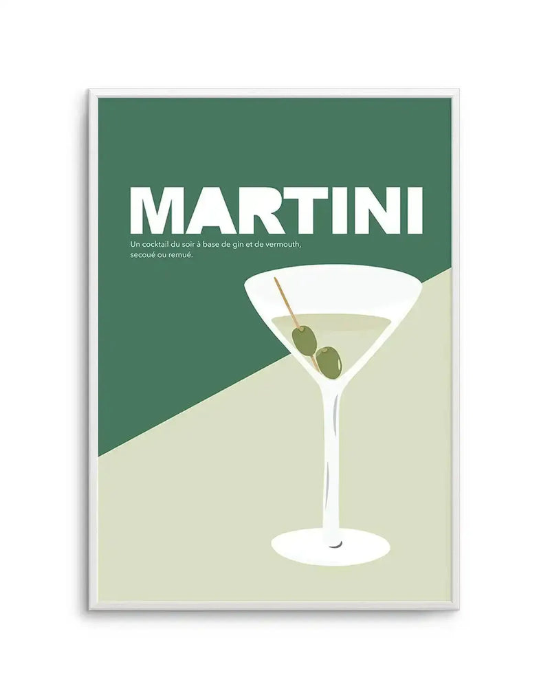 Art print featuring a minimalist illustration of a martini glass with two green olives on a pick, set against a two-tone background of dark green and light sage green. The word "MARTINI" is prominently displayed in large white letters at the top, with the French text "Un cocktail du soir à base de gin et de vermouth, secoué ou remué." (An evening cocktail made with gin and vermouth, shaken or stirred.) below it. The composition is clean and graphic, with a white frame.