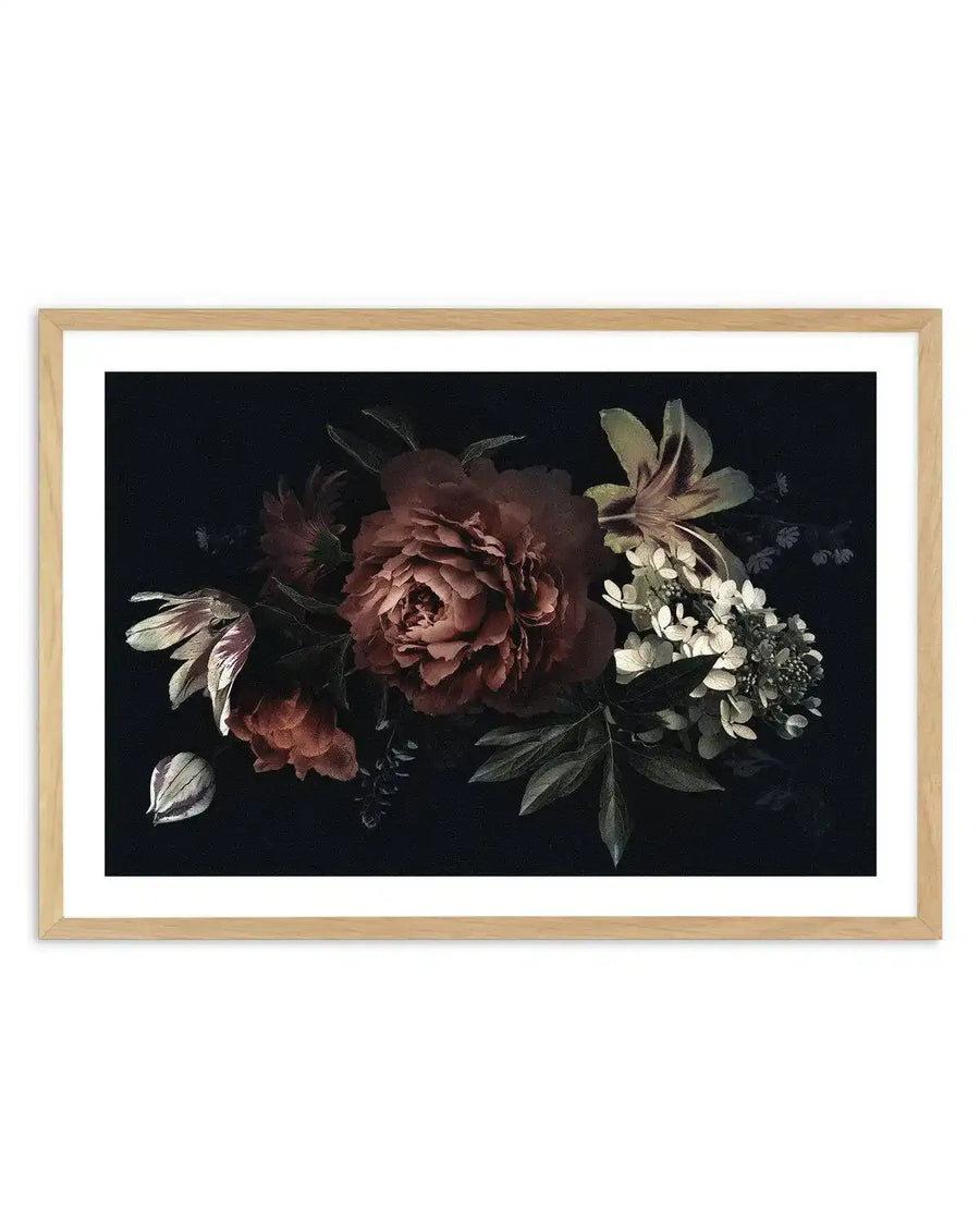 Art print featuring a dramatic botanical illustration of dark, moody flowers on a black background, displayed in a natural oak frame with white border. The composition includes a large central peony in deep burgundy and rust tones, surrounded by smaller blooms in similar hues, pale cream and green hydrangeas, and slender green leaves.