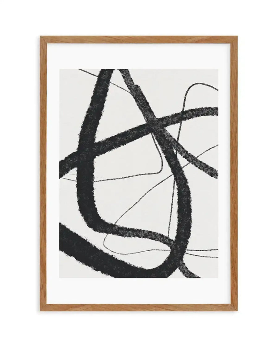 Abstract art print featuring bold, thick black brushstrokes forming intersecting lines and curves on a clean white background, creating a dynamic and energetic composition. Printed on fine art paper and displayed in a natural oak frame with white border.