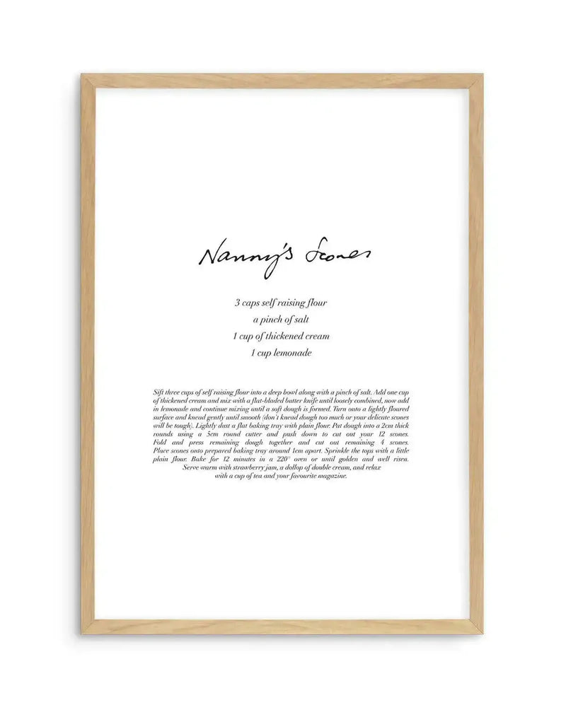 Art print featuring a handwritten recipe for "Nanny's Scones" in black script on a white background, printed on fine art paper and displayed in a natural oak frame with white border. The recipe lists ingredients and instructions for making scones.