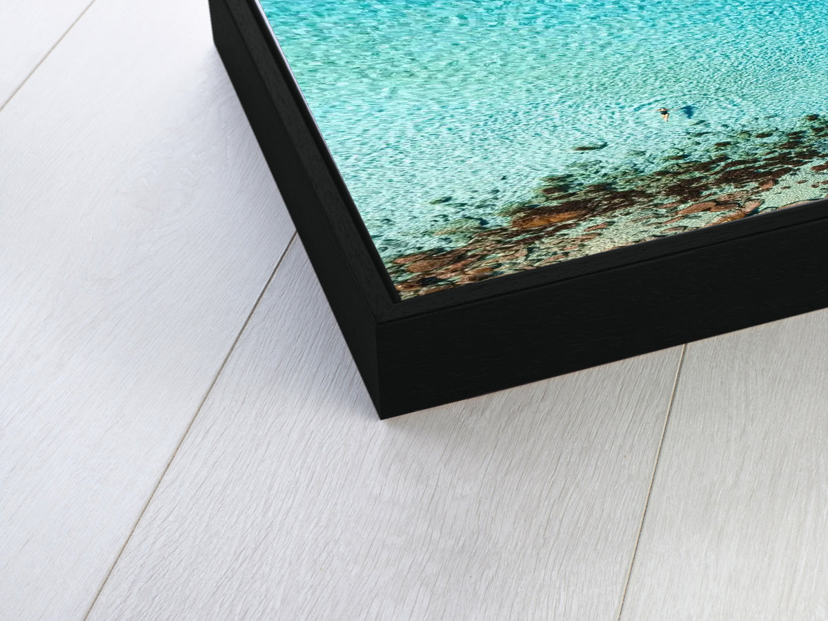 Close-up photograph of Meelup aerial artwork in a black floating frame with a recessed shadowline
