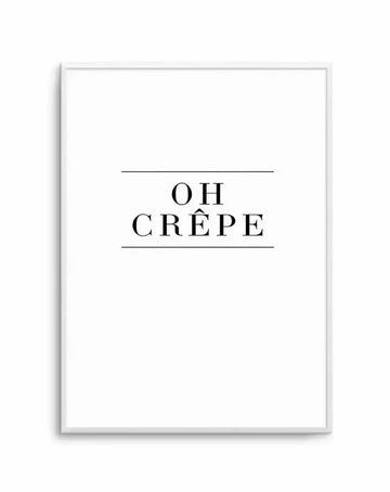 Art print in a silver-gray frame displaying the text "OH CRÊPE" in black serif typeface, centered on a white background with horizontal lines above and below the text, creating a minimalist, typographic design with a clean, gallery-style presentation.