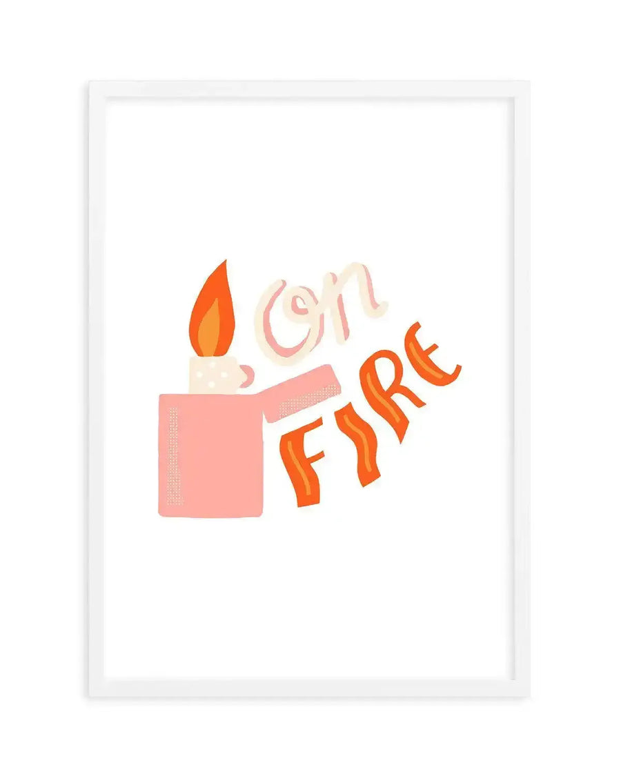 Art print featuring a playful illustration of a pink lighter with a bright orange and yellow flame, next to the hand-lettered words "ON FIRE" in a similar orange and pink palette, displayed in a white frame.