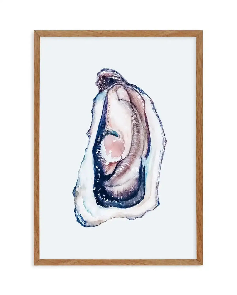 Watercolour art print featuring a single oyster shell in shades of deep indigo, soft grey, and pale pink, with a hint of a pearl inside, displayed in a natural oak frame with white border.