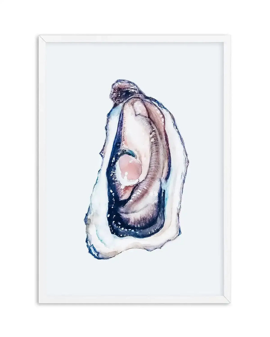 Watercolour art print featuring a single oyster with an open shell, revealing a soft pink pearl nestled within. The oyster shell is depicted with shades of deep indigo, navy blue, and white, with subtle hints of brown and purple in the inner folds, and is displayed in a white frame with a white border.