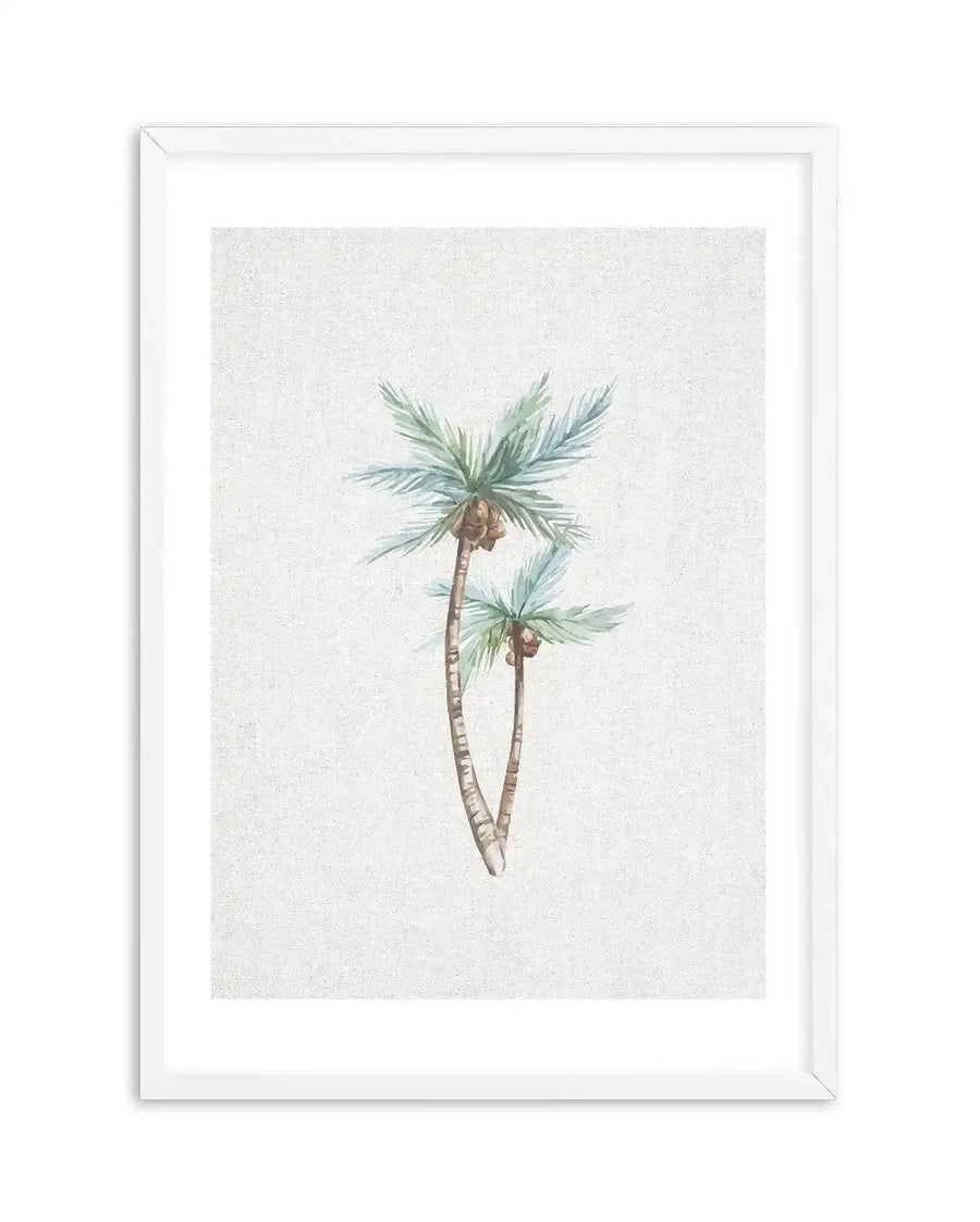 Watercolour art print featuring two palm trees with light green fronds and brown coconuts, painted with soft brushstrokes on a textured off-white background, displayed in a white frame with a white border.