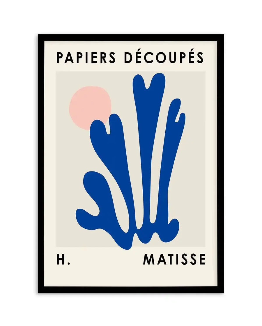 "Framed art print with a black frame and white border, featuring a blue abstract shape resembling a plant or coral, with a soft pink circle in the upper left, on a cream background. The print is titled 'PAPIERS DÉCOUPÉS' at the top and 'H. MATISSE' at the bottom."