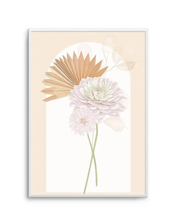Art print featuring a minimalist illustration of a floral arrangement within an arched shape on a cream background, displayed in a white frame with a white border. The arrangement includes a large, light pink dahlia, a smaller pale pink daisy, and a dried palm frond in a warm tan colour, with delicate, translucent seed pods floating above.