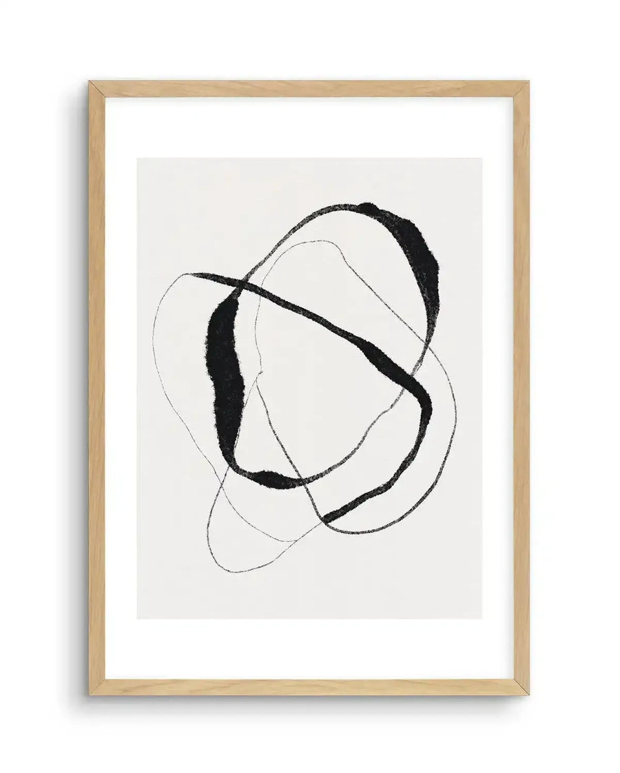 Abstract art print featuring bold, free-flowing black lines and brushstrokes on a crisp white background, creating an intertwined, organic composition. Printed on fine art paper and displayed in a natural oak frame with white border.