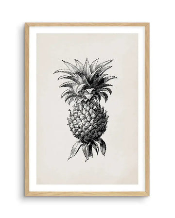 Black and white botanical illustration art print featuring a detailed pineapple with spiky crown and textured fruit, printed on fine art paper and displayed in a natural oak frame with white border.