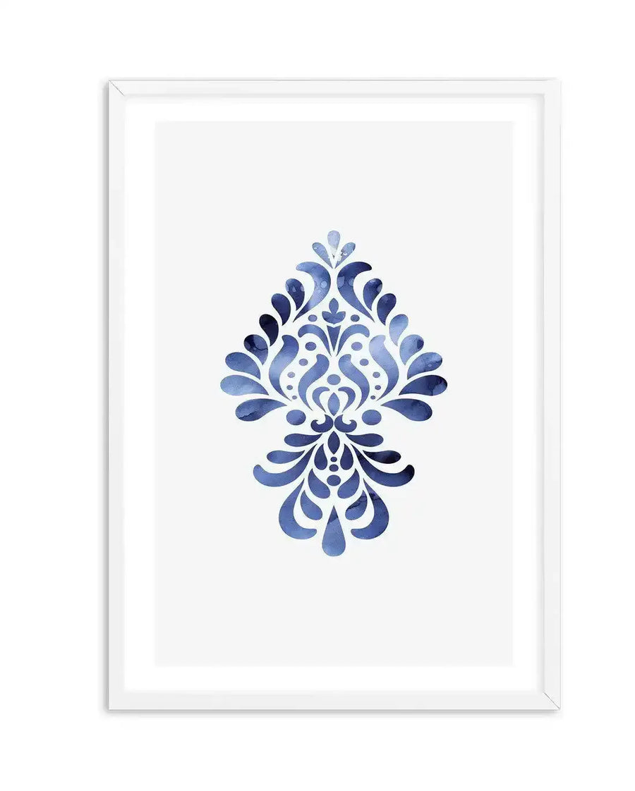 Watercolour art print featuring a symmetrical damask-style motif in varying shades of deep blue and indigo on a crisp white background, displayed in a white frame with white border. The design has a fluid, organic quality with visible brushstroke texture.