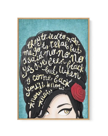 Framed canvas art print featuring an illustration of a woman's face in profile against a turquoise background. Her voluminous black hair is filled with white handwritten song lyrics. A bright red rose is pinned to her hair near her ear. She has defined black winged eyeliner and a pale complexion. The canvas is mounted in a natural wood frame with no border.