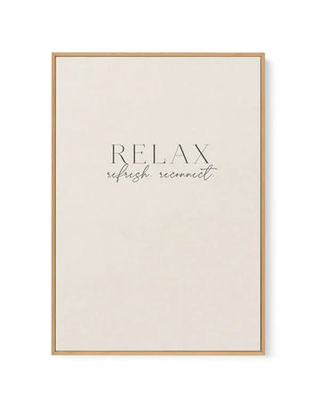 Framed canvas art print with natural wood frame displaying centered text in a minimalist design. The background is cream-colored with subtle texture. Text reads "RELAX" in thin capital letters, followed by "refresh. reconnect." in flowing cursive script below. The overall composition is centered and simple, evoking a calm, wellness-focused aesthetic.