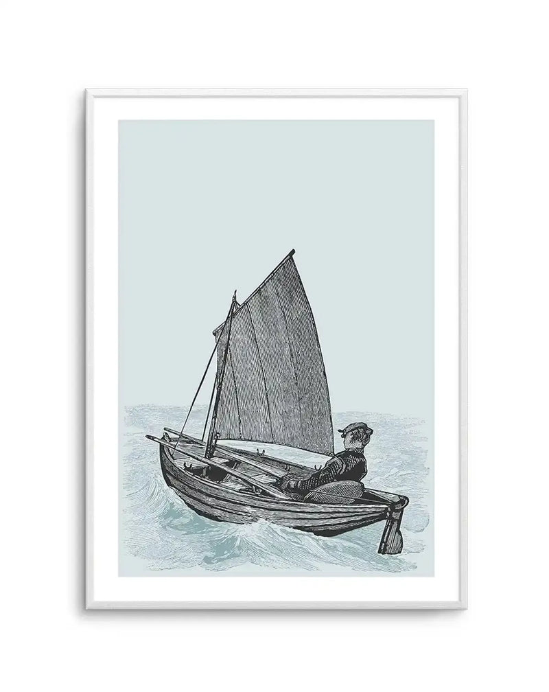 Art print featuring a black and white illustration of a man sailing a small boat on a light blue background. The man, wearing a cap, sits in the boat with a single sail, navigating through choppy waves. The illustration has a vintage, etched quality with visible line work. The print is displayed in a white frame with a white border.