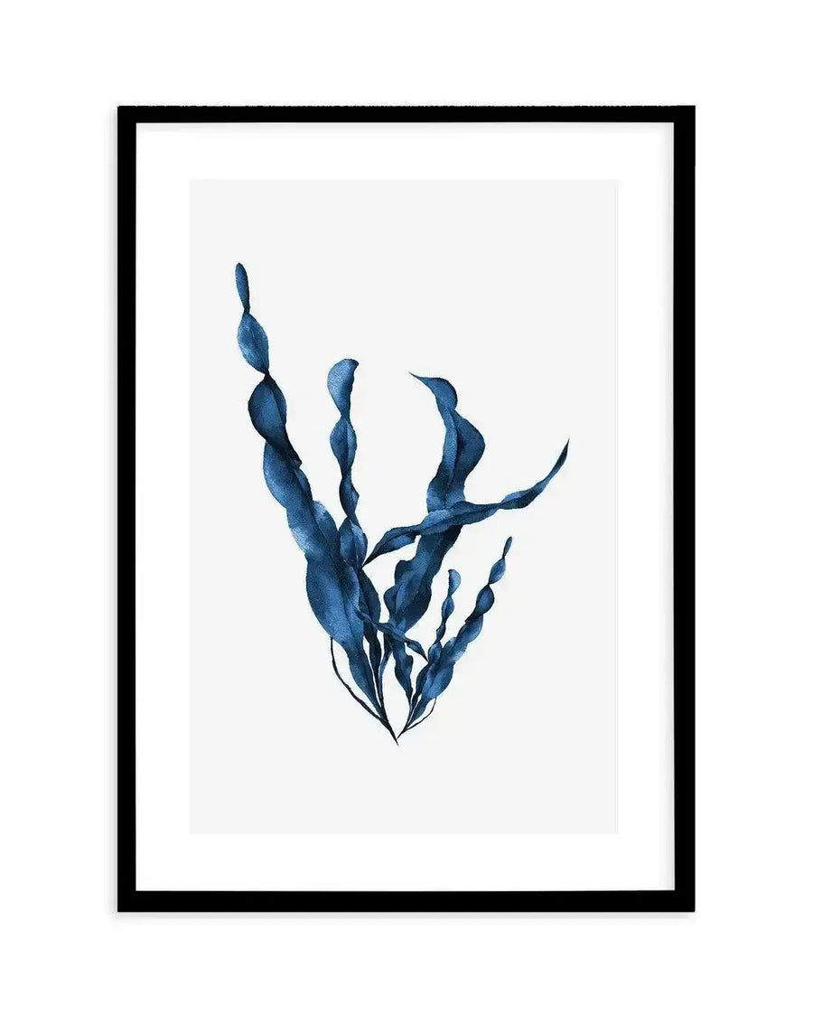 Watercolour art print featuring a cluster of sea kelp in deep indigo blue with organic, flowing shapes and visible brushstroke texture, printed on fine art paper and displayed in a black frame with white border.