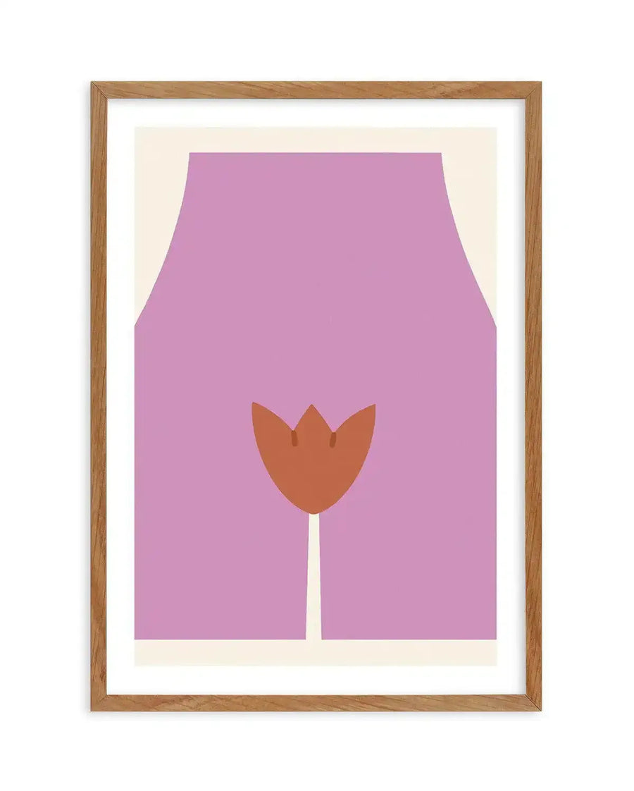 Abstract art print featuring a stylized illustration of a female torso in a muted lavender hue, with a rust-orange tulip shape representing the vulva, printed on fine art paper and displayed in a natural oak frame with white border.