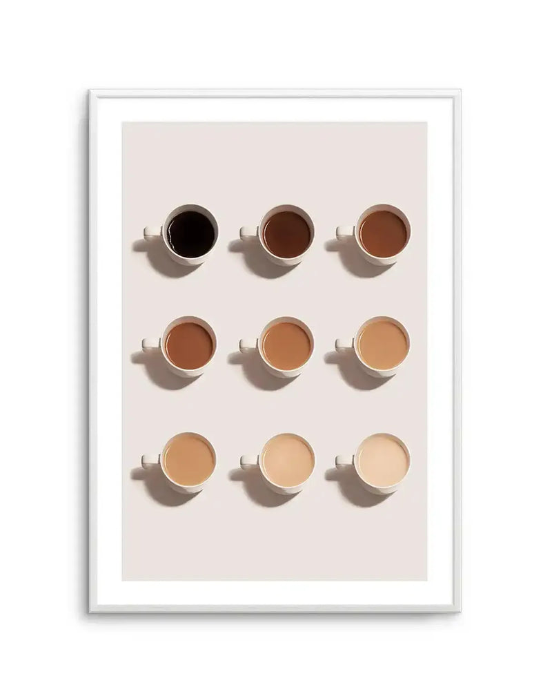 Framed art print featuring nine white ceramic coffee cups arranged in a 3x3 grid on a light beige background, each containing coffee of progressively lighter shades from dark black to pale cream, with subtle shadows cast to the right of each cup.