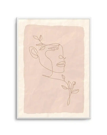 Line art print featuring a continuous line drawing of a woman's profile facing right, with delicate leaves growing from her head and neck, on a textured background of soft blush pink and cream, displayed in a white frame with a white border.