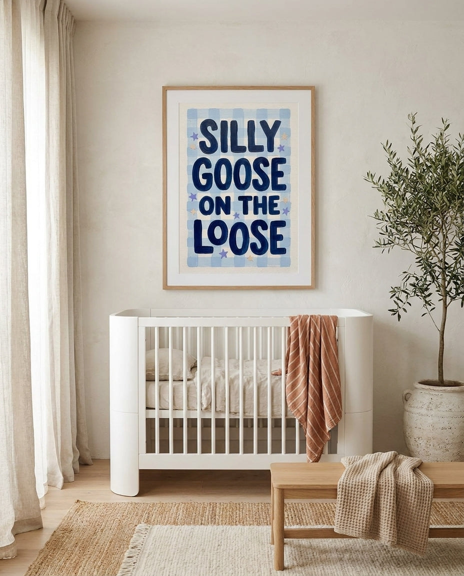 Silly Goose nursery art print framed and styled on the wall of a coastal Australian baby room at Olive et Oriel
