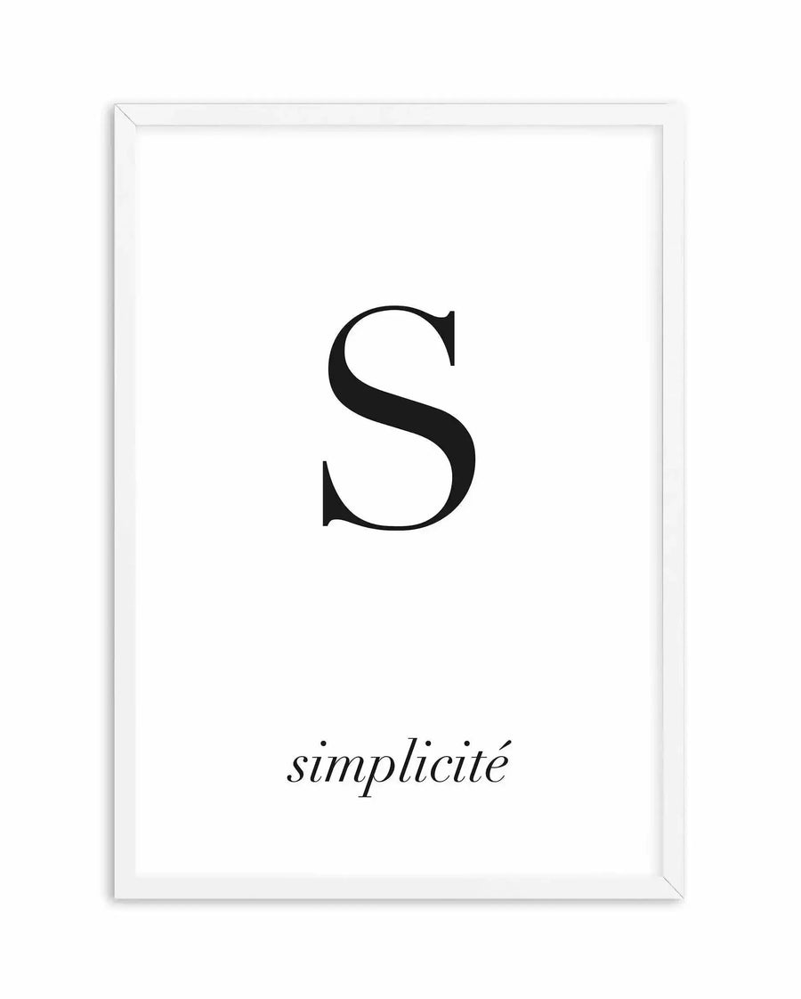 Framed art print featuring a large black uppercase letter S centered on a white background, with the word "simplicité" in italic script below it. The print is mounted in a white wooden frame with a white border.