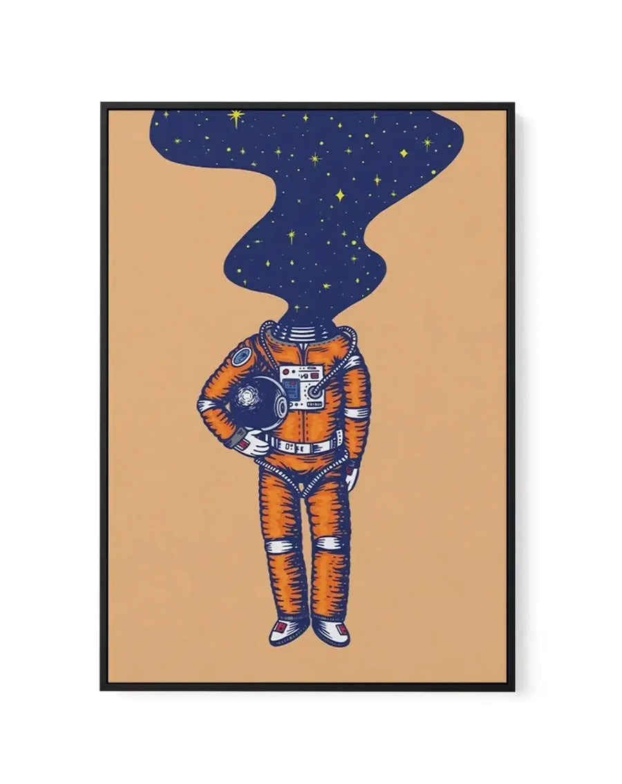 Framed canvas art print featuring an illustration of an astronaut in an orange and white spacesuit holding a helmet, set against a tan background. The astronaut's head is replaced by a dark blue night sky filled with scattered yellow and white stars. Black frame with white border around the artwork.