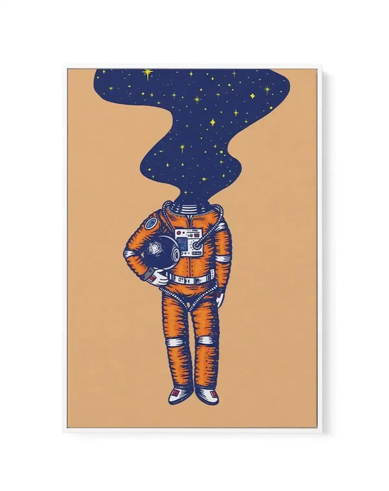 Framed canvas art print featuring an illustration of an astronaut in an orange and white spacesuit holding a helmet, set against a tan background. The astronaut's head is replaced by a wavy, dark navy blue silhouette filled with scattered yellow stars and celestial symbols, creating a surreal, dreamlike composition. The artwork has a hand-drawn illustration style with bold line work and limited color palette. The canvas is mounted in a simple gray frame with a white border.