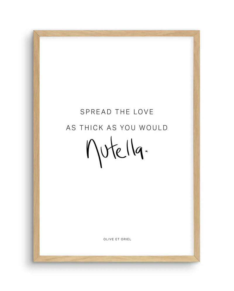 Framed art print with natural wood frame displaying black text on white background. The text reads "SPREAD THE LOVE AS THICK AS YOU WOULD" in thin sans-serif letters, followed by "Nutella" in a casual handwritten script style. Small text at bottom reads "OLIVE ET ORIEL" in sans-serif font. The composition is centered and minimalist with ample white space surrounding the text elements.