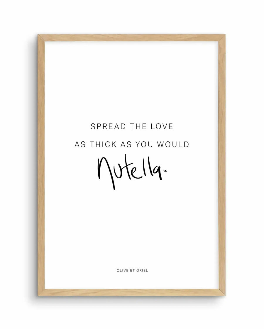 Framed art print with natural wood frame displaying black text on white background. The text reads "SPREAD THE LOVE AS THICK AS YOU WOULD" in thin sans-serif letters, followed by "Nutella" in a casual handwritten script style. Small text at bottom reads "OLIVE ET ORIEL" in sans-serif font. The composition is centered and minimalist with ample white space surrounding the text elements.