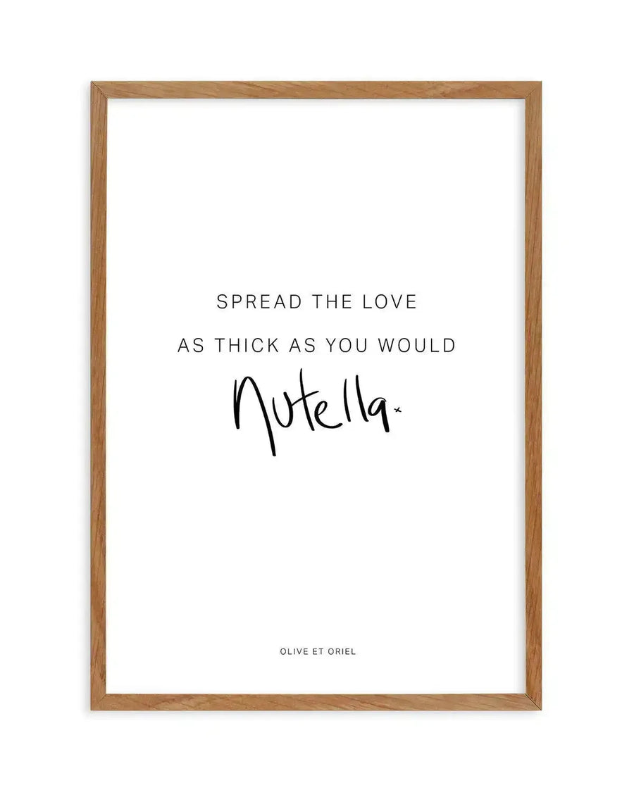 Framed art print with natural wood frame displaying white background text. Top section in thin sans-serif capital letters reads "SPREAD THE LOVE / AS THICK AS YOU WOULD". Center features "Nutella" written in bold black handwritten script with a small decorative dot. Bottom text in small capitals reads "OLIVE ET ORIEL". Minimalist design with ample white space and centered composition.