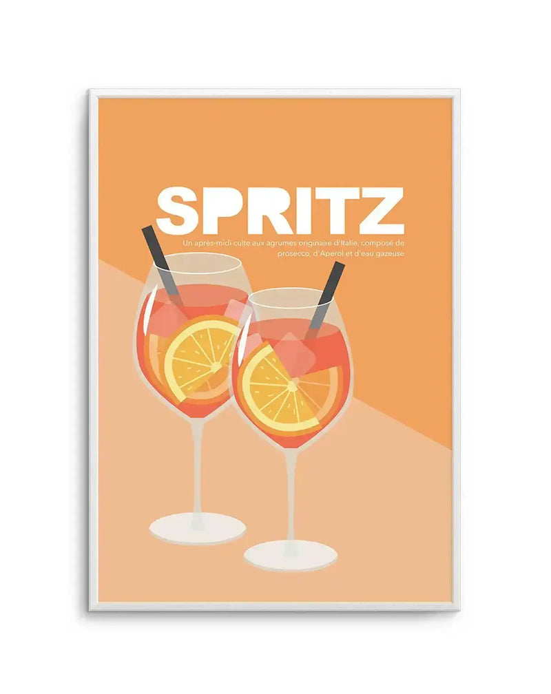 Art print featuring a minimalist illustration of two Aperol Spritz cocktails in stemmed glasses on an orange background. The drinks are a vibrant orange-red with ice cubes and a slice of orange, and each glass has a black straw. The background is divided into two shades of orange, with a lighter peach tone at the bottom. The text "SPRITZ" is in large white letters at the top, with a smaller description in French below. The print is displayed in a thin white frame.